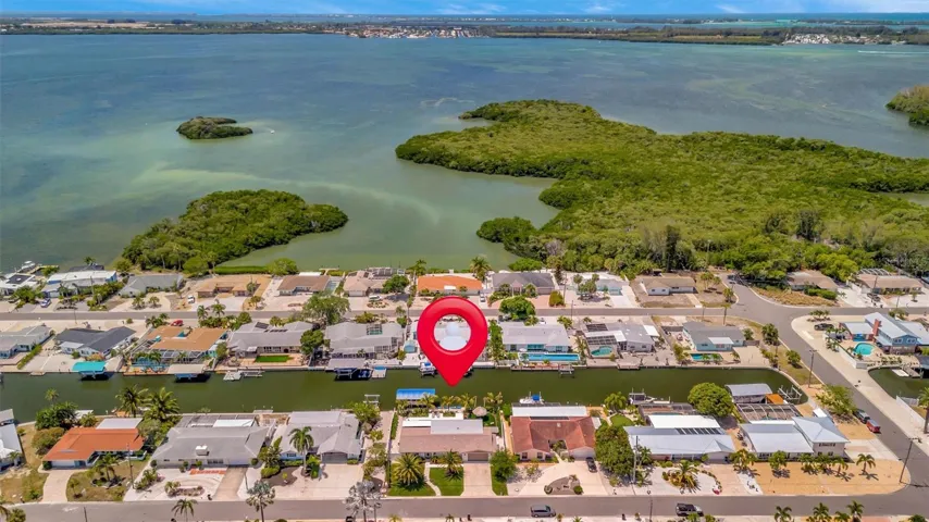 Near Palma Sola Causeway Park, with convenient access to Bradenton and Sarasota shopping, dining, and amenities.