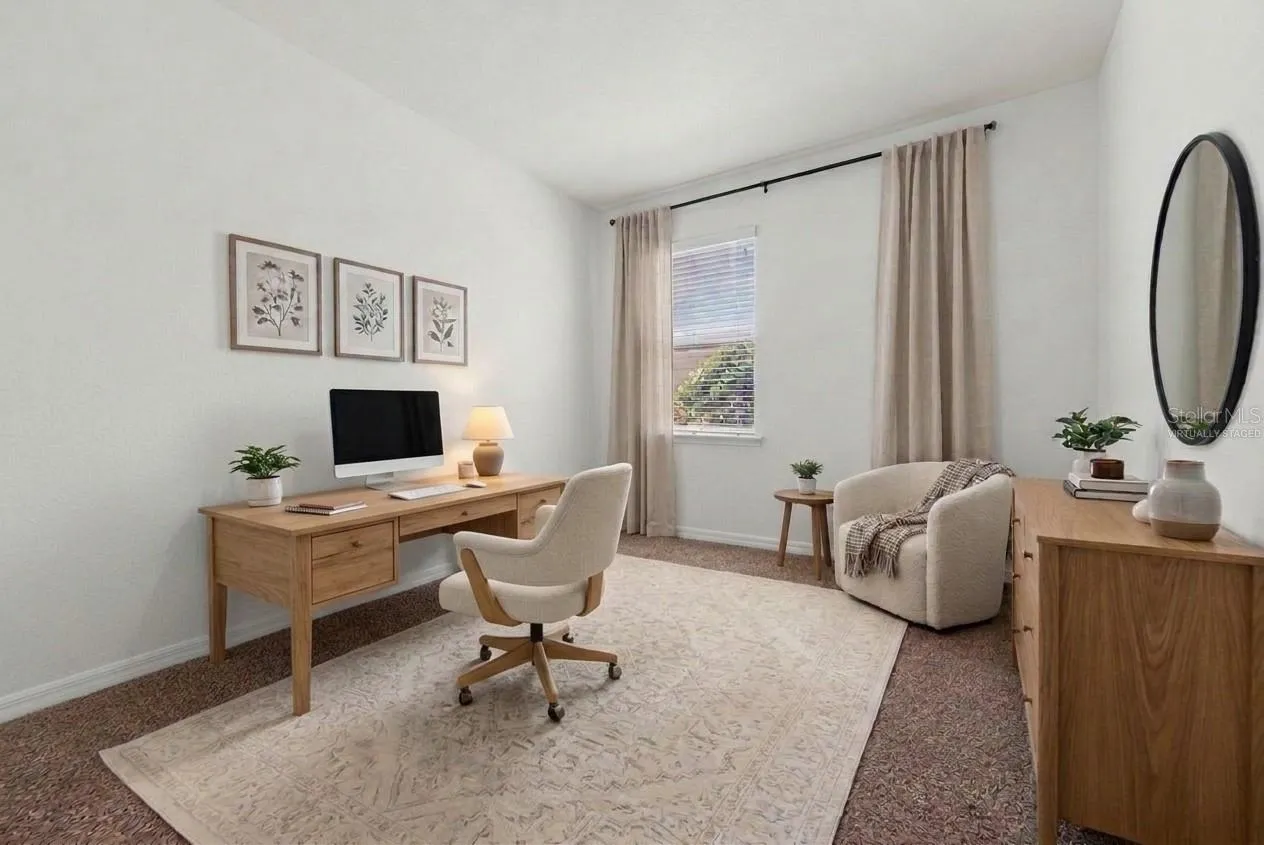 Virtually staged. 2nd bedroom/office. New carpeting