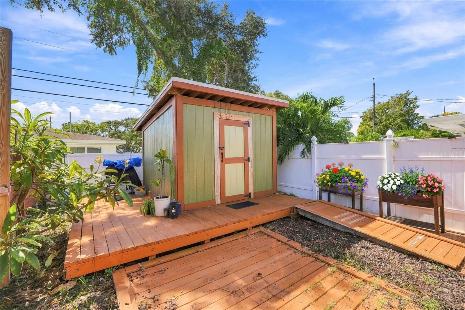 Outdoor shed for plenty of storage.