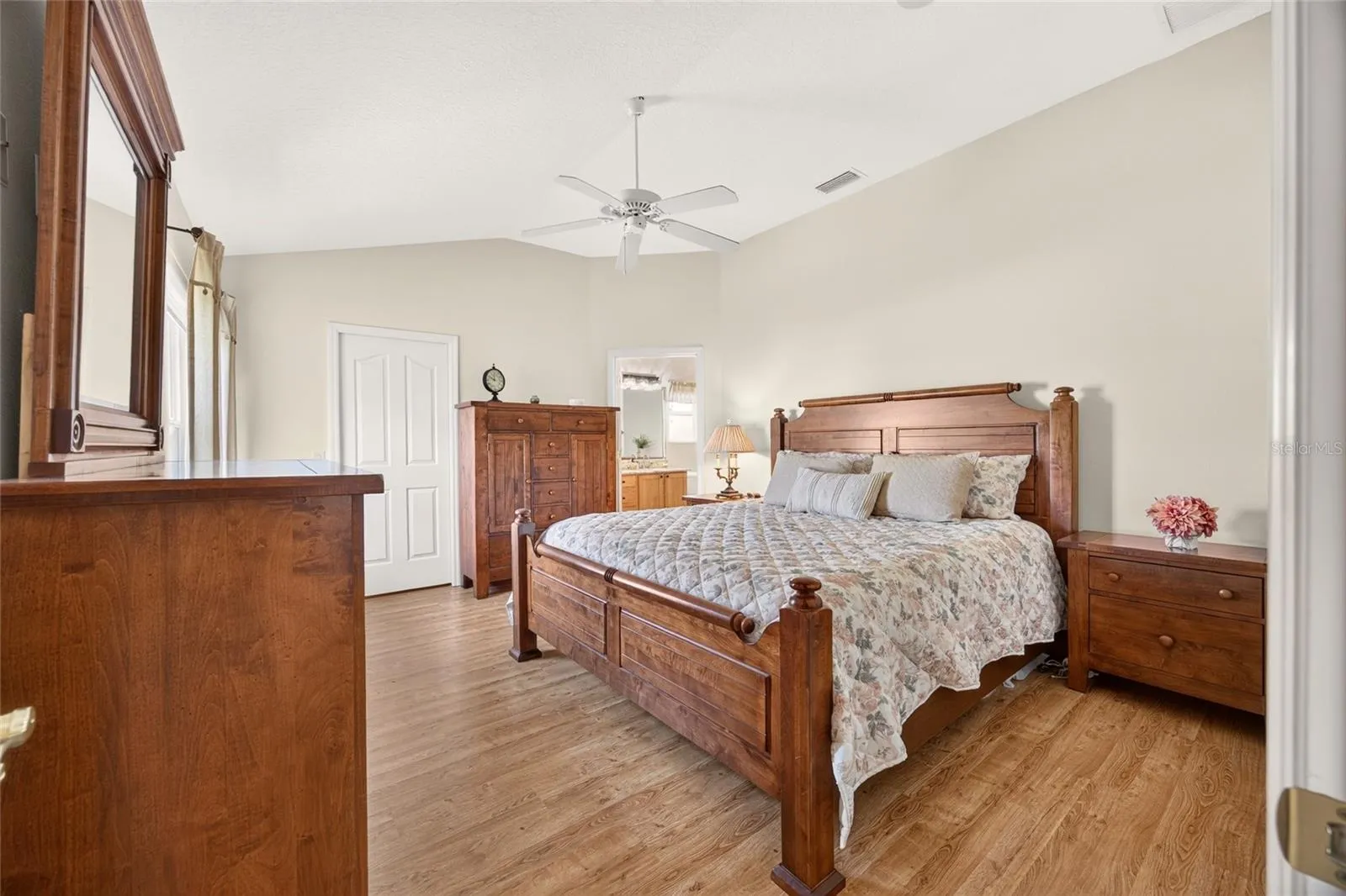 The primary bedroom offers a comfortable retreat—a welcoming space to unwind and recharge at the end of the day.