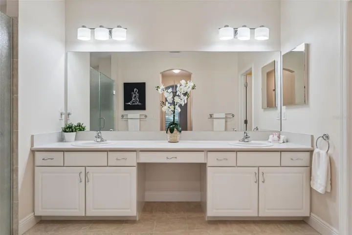 14'6" x 7'6" Primary Bathroom w/ dual sinks &amp; a large glass enclosed walk-in shower