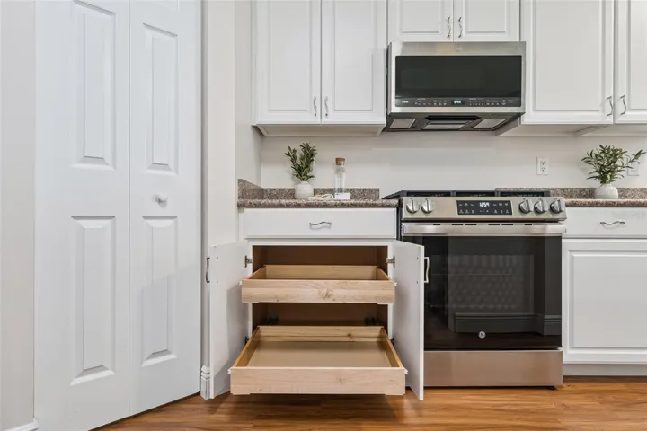 Kitchen cabinets has Pull-out shelving &amp; 2 closet pantry's