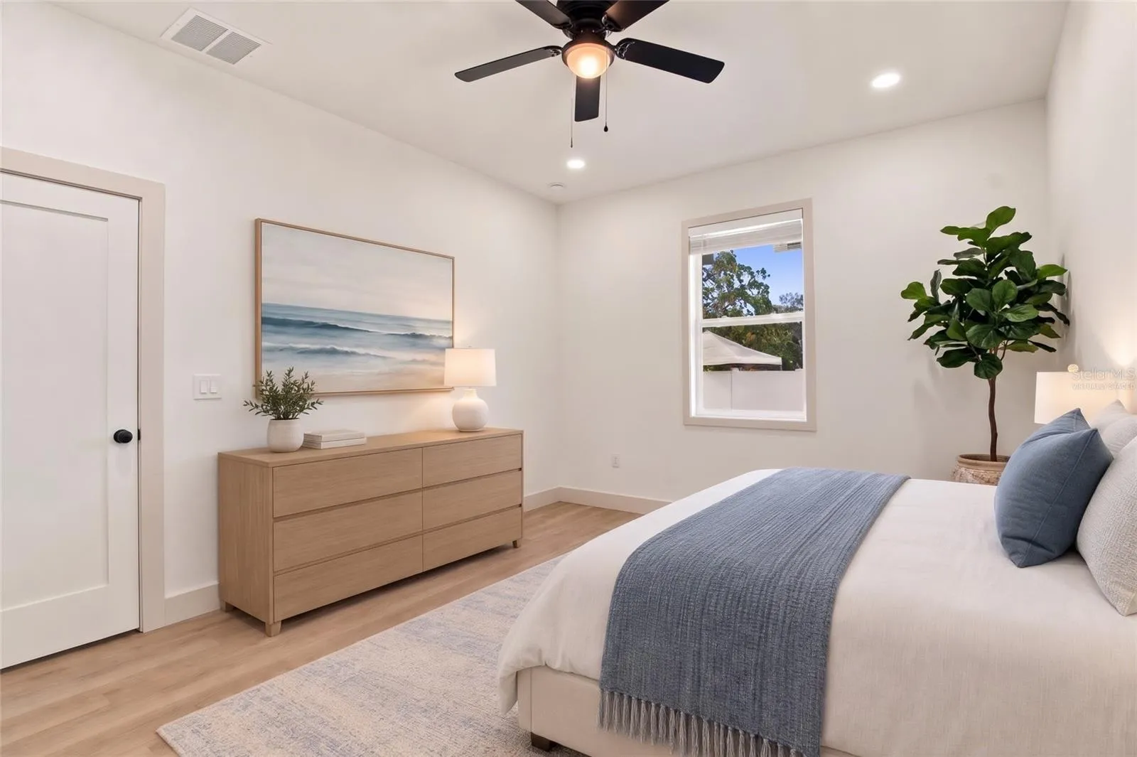 virtually staged primary bedroom