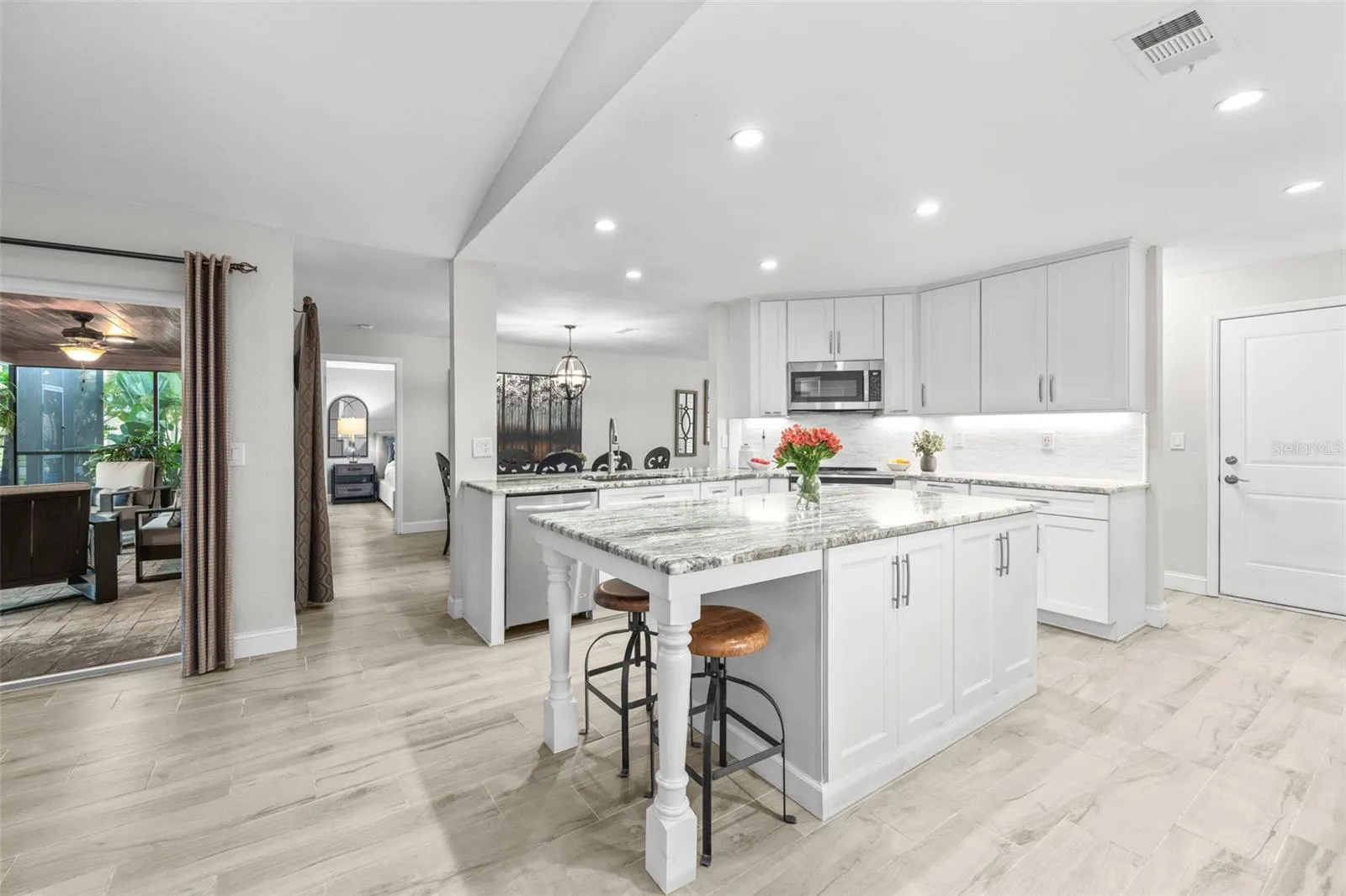 Ample kitchen island with area to sit