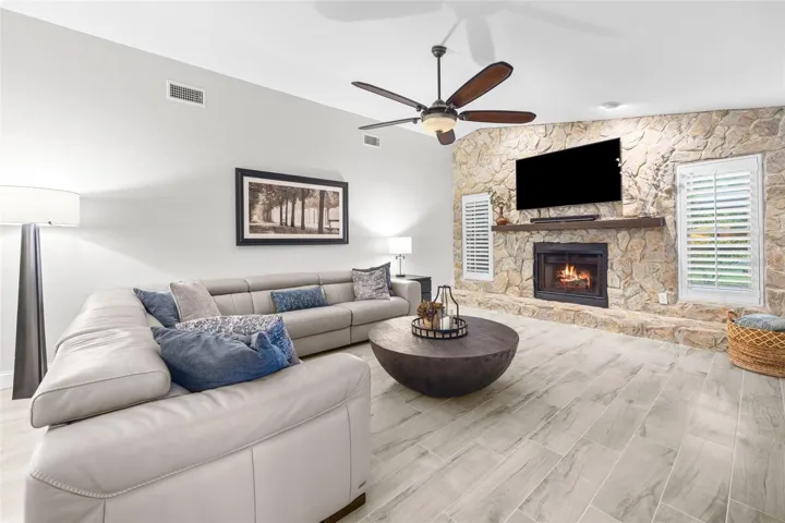 Family room with vaulted ceiling, with access to pool