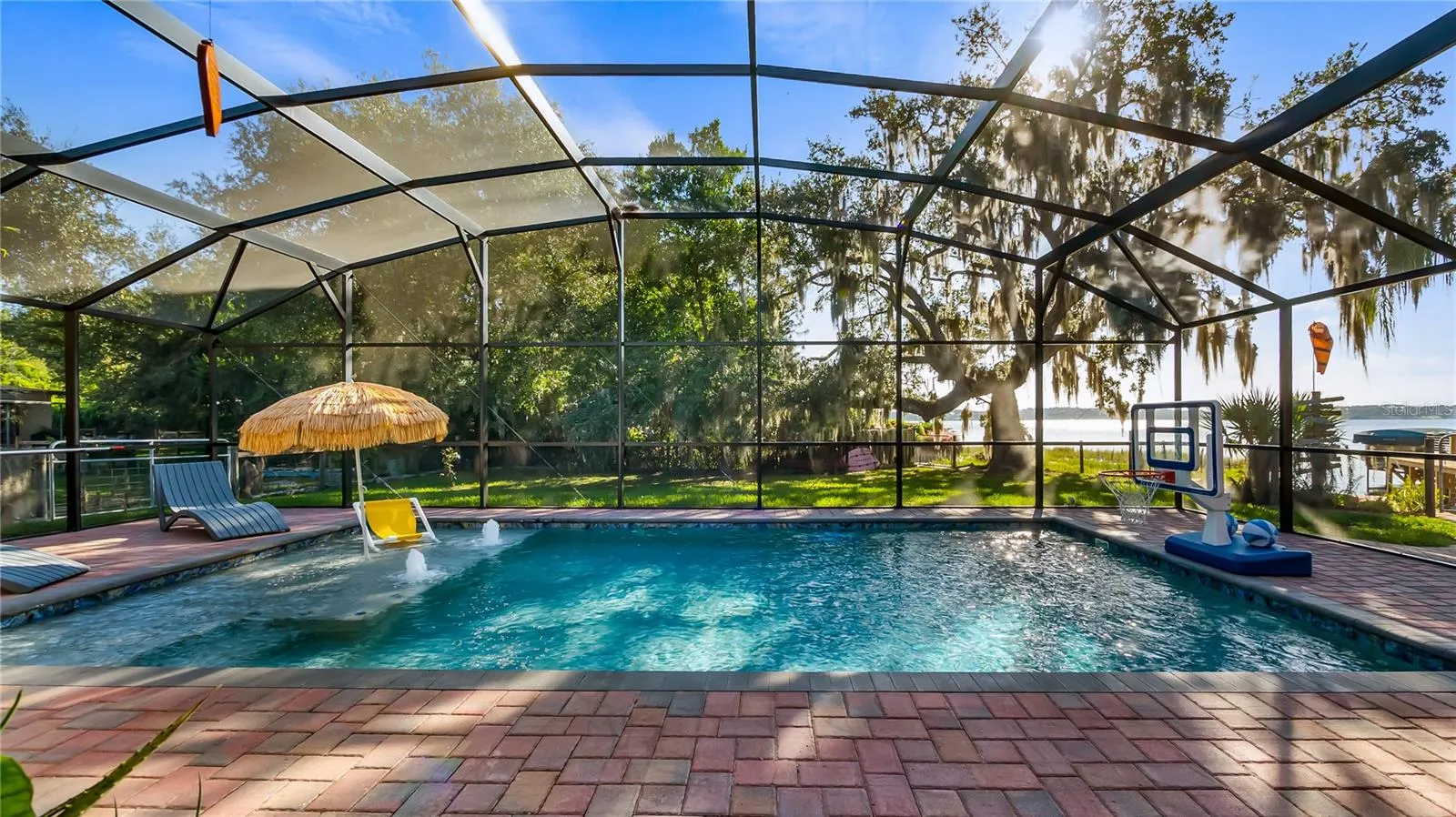 2 sets of sliders from great room to rear covered porch/pool added in 2023