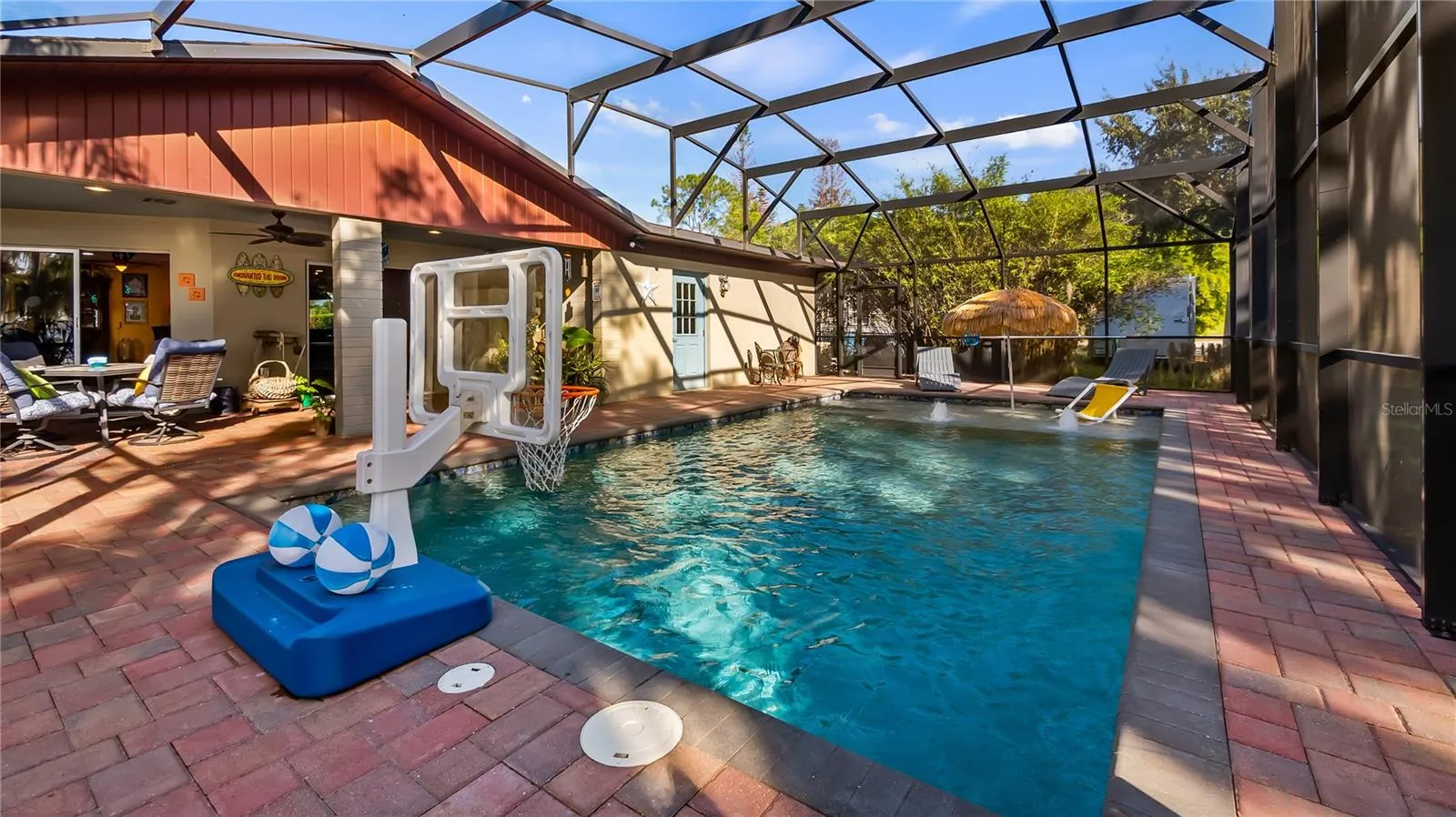 2 sets of sliders from great room to rear covered porch/pool added in 2023