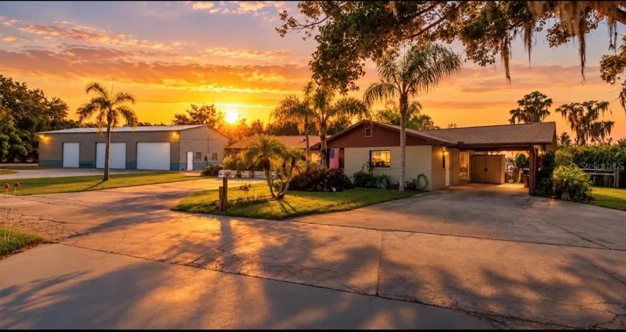 Main Home facing Nita Place, Metal building to the left (north) of the main home. Corner of Lakeshore and Nita place Virtual picture view of behind the home sunrise over the home directly on Lake Minnehaha.