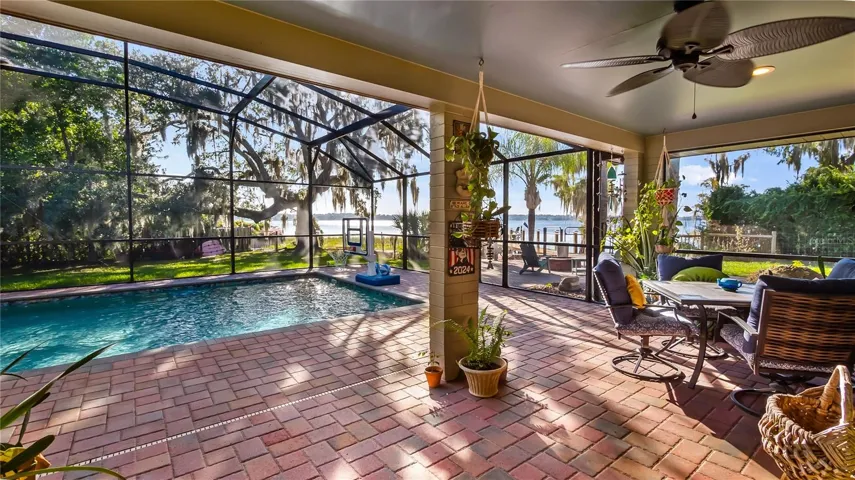 2 sets of sliders from great room to rear covered porch/pool added in 2023