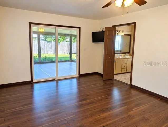 Primary bedroom opening to porch