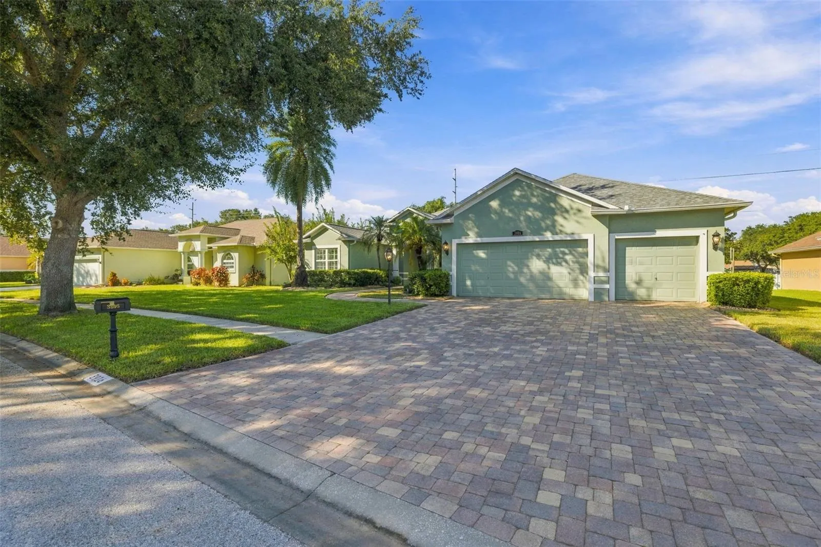 Entry Sidewalk &amp;  Driveway all in Pavers to marvel at your home!
