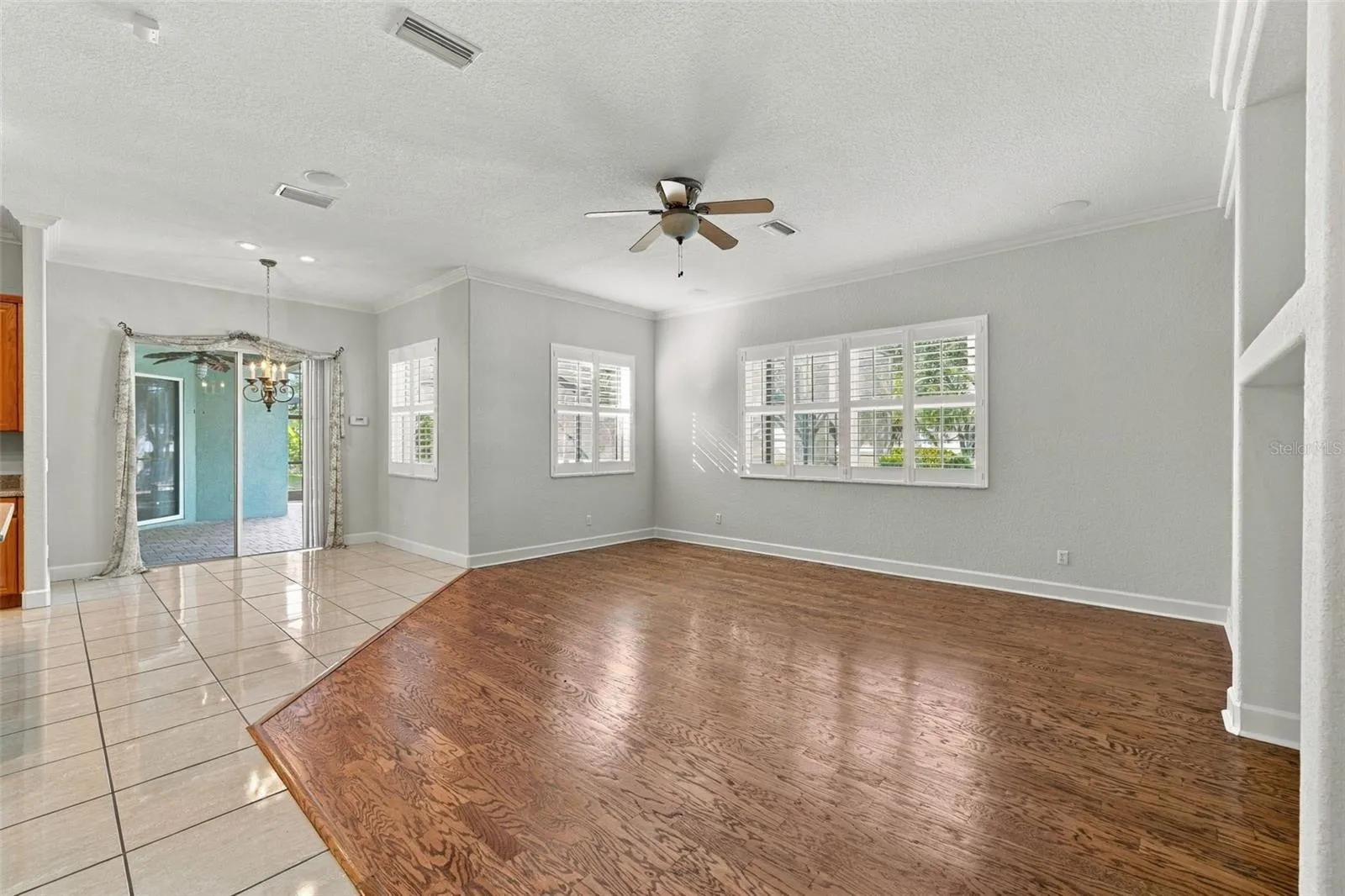 Breakfast Nook &amp; Slider out to Pool/Spa! Great Room in Real Wood Flooring!  Crown Molding &amp; Plantation Shutters!
