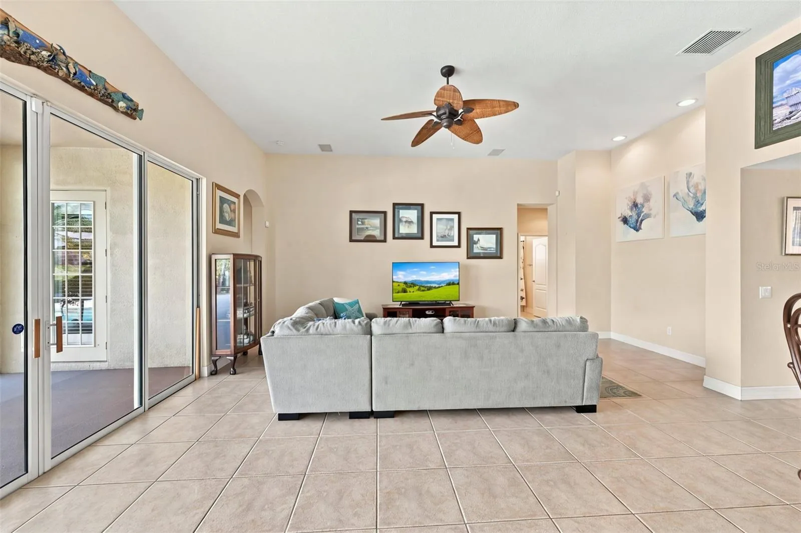 Modern color palette enhances the beauty and peacefulness of the home.  Open the large sliding doors and let the sea breezes flow throughout each room.