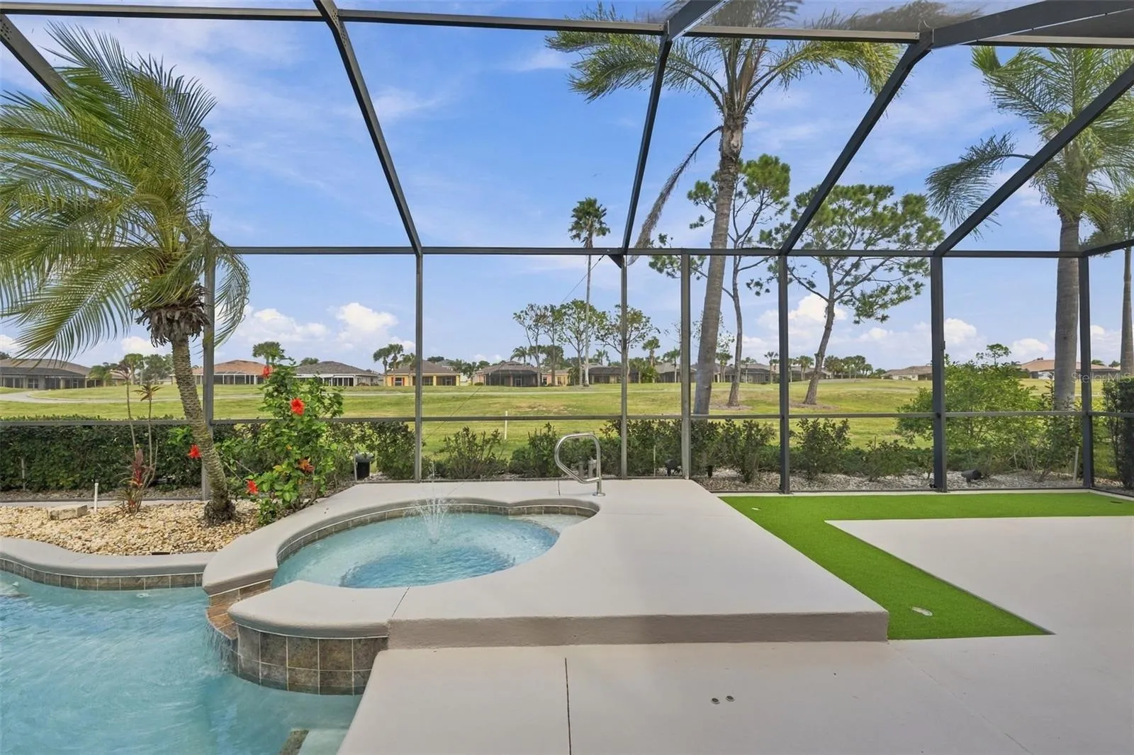 A heated spa with a water fountain so that you always hear the relaxing sound of water.  You even have your own putting green!