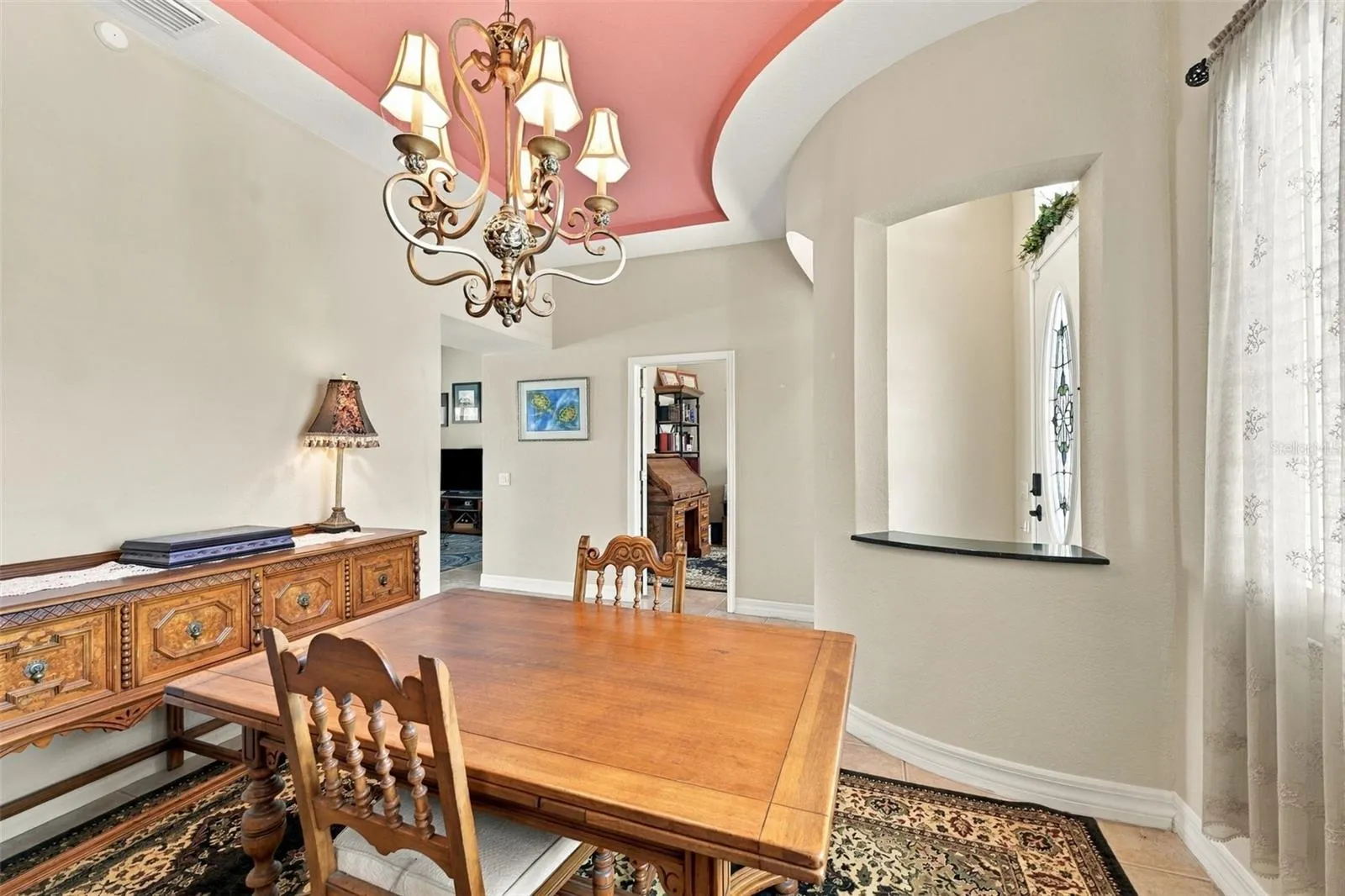 If you don't need a dining room, this room is perfect as a music room, elegant living room or library, due to it's unique architectural features.