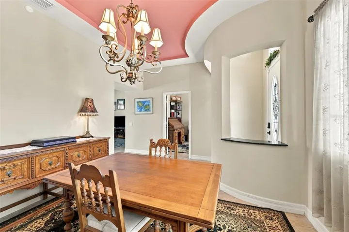 If you don't need a dining room, this room is perfect as a music room, elegant living room or library, due to it's unique architectural features.