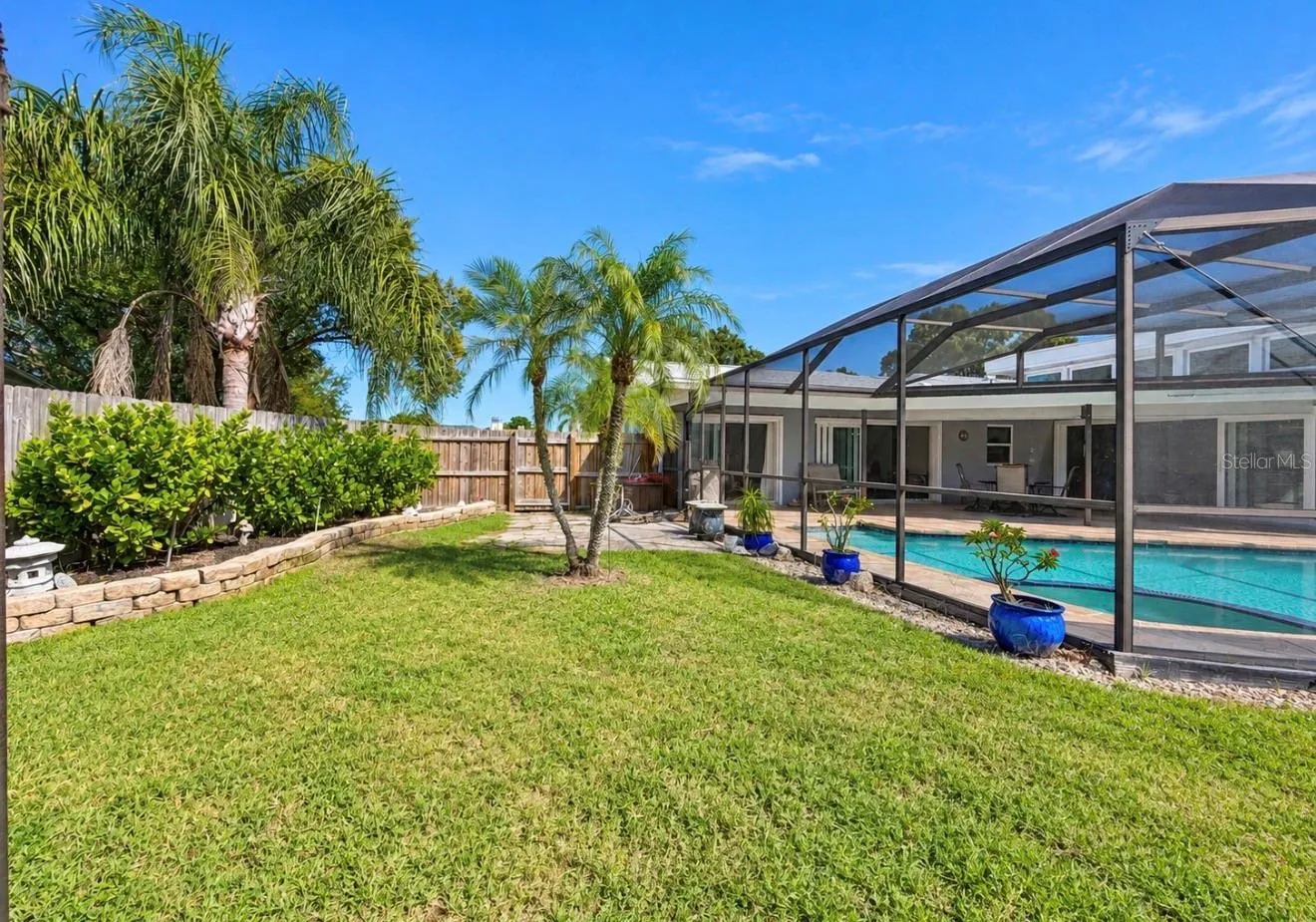 Yard with pool enclosure