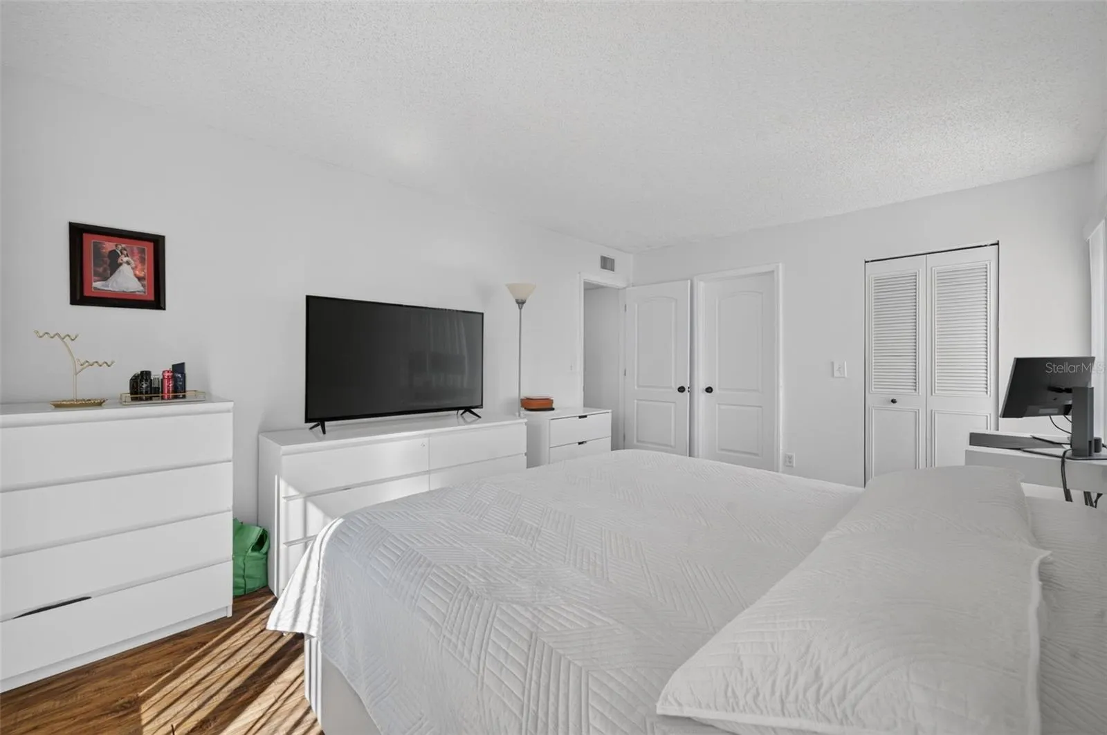 Primary bedroom with ensuite bathroom