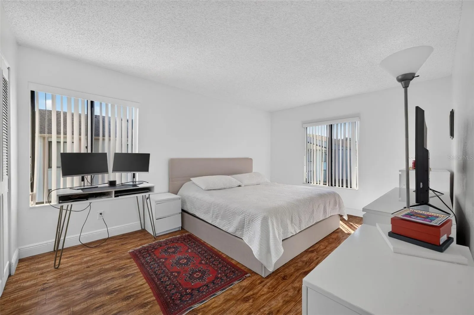 Primary bedroom with garden views