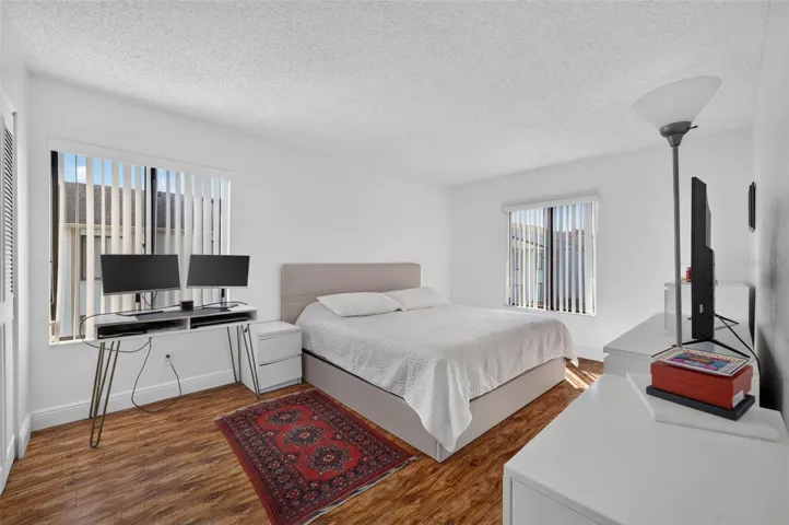 Primary bedroom with garden views