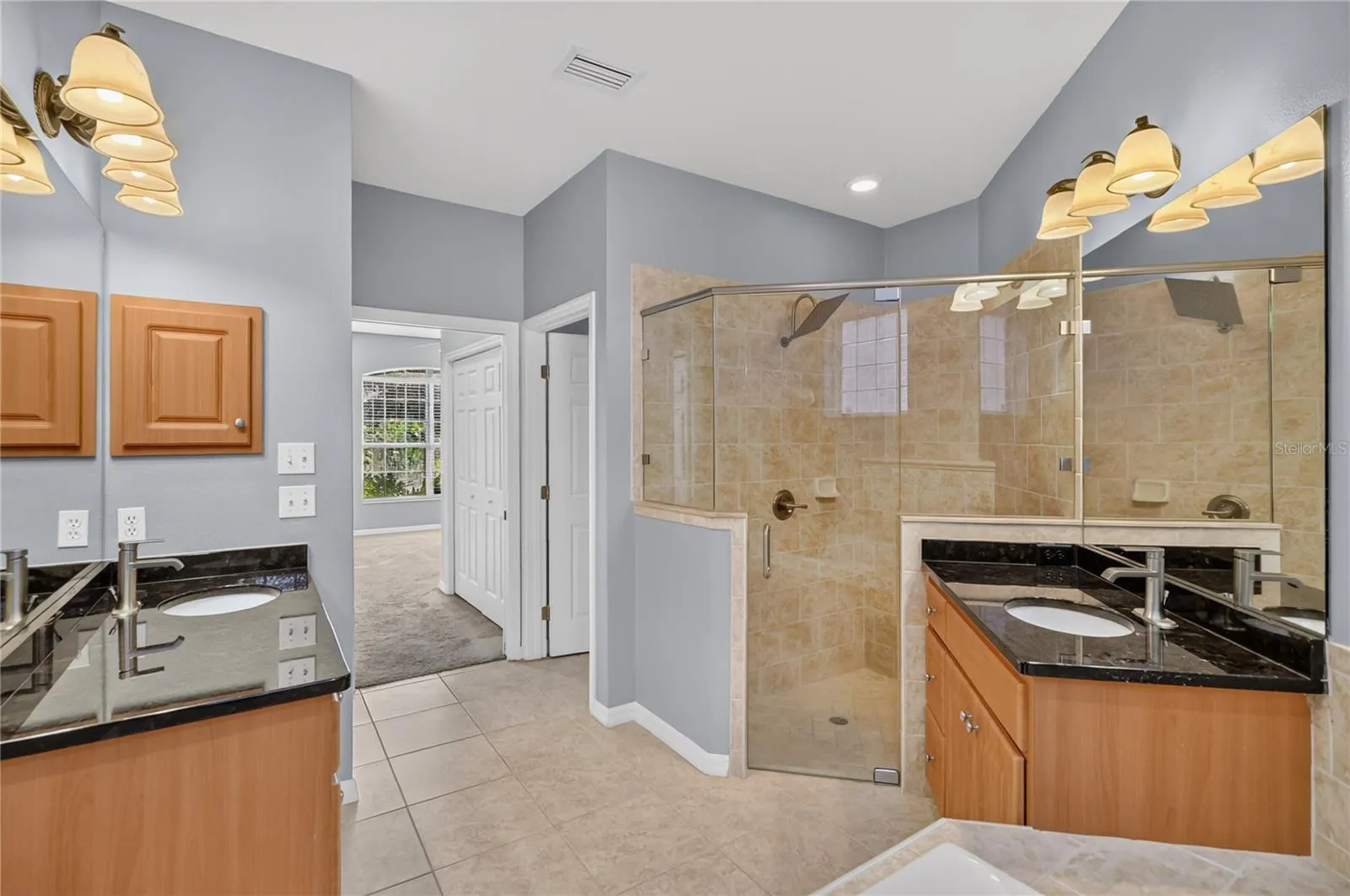 Master Bathroom with Dual Sinks and Walk In Shower