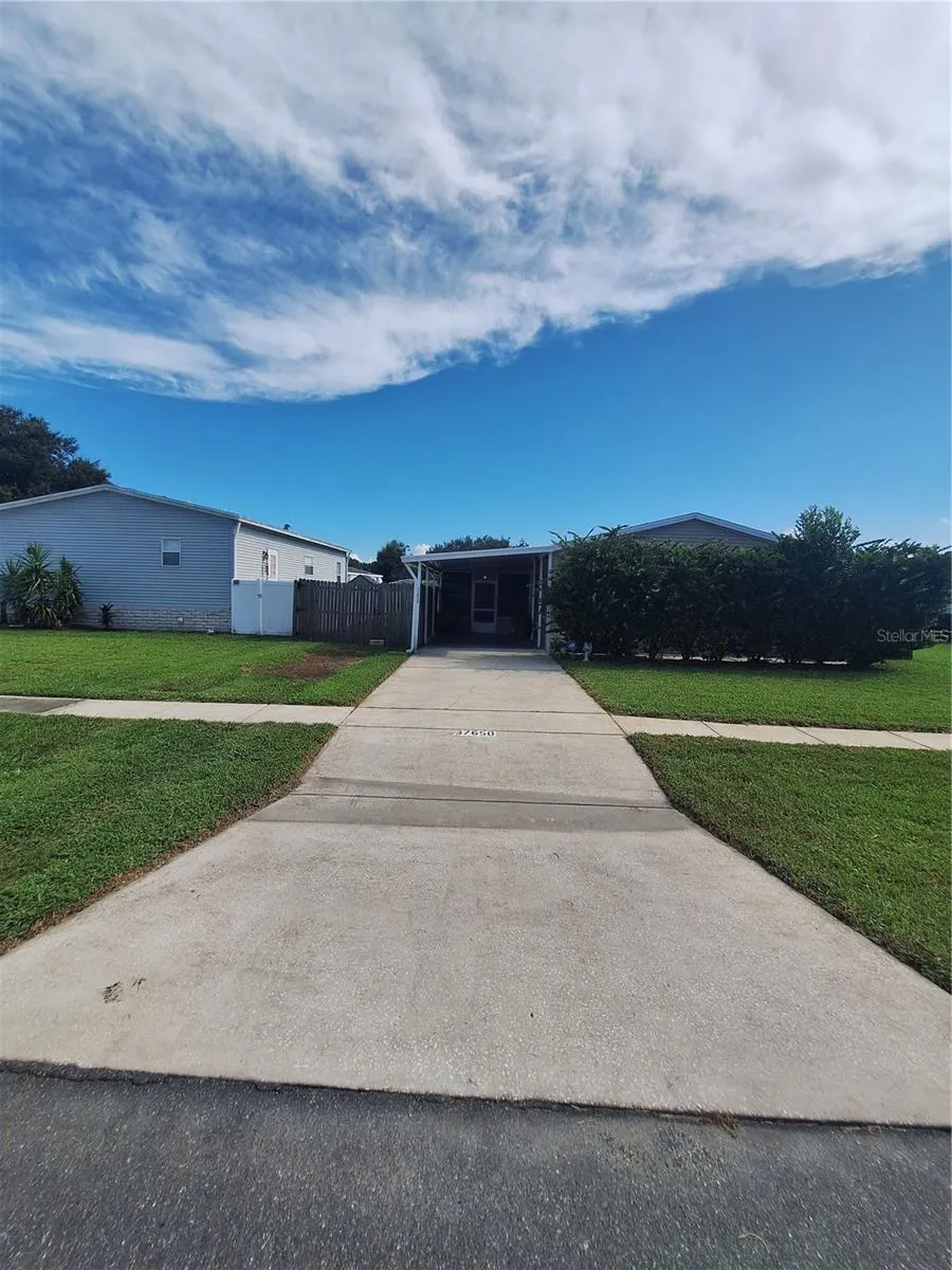 Concrete Driveway to Carport