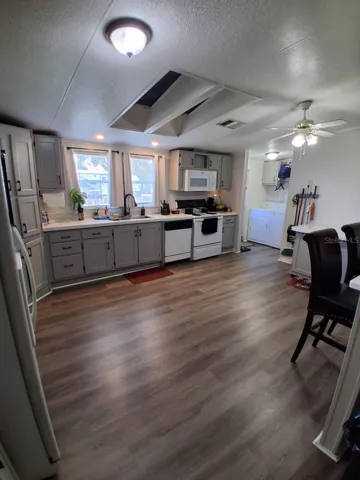 Spacious and loaded with cabinets.