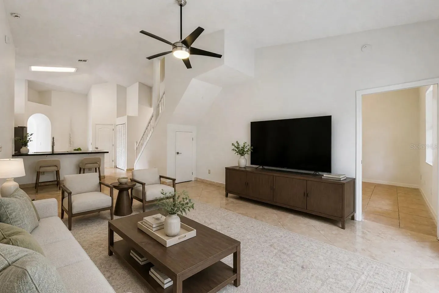 Family room with vaulted ceiling