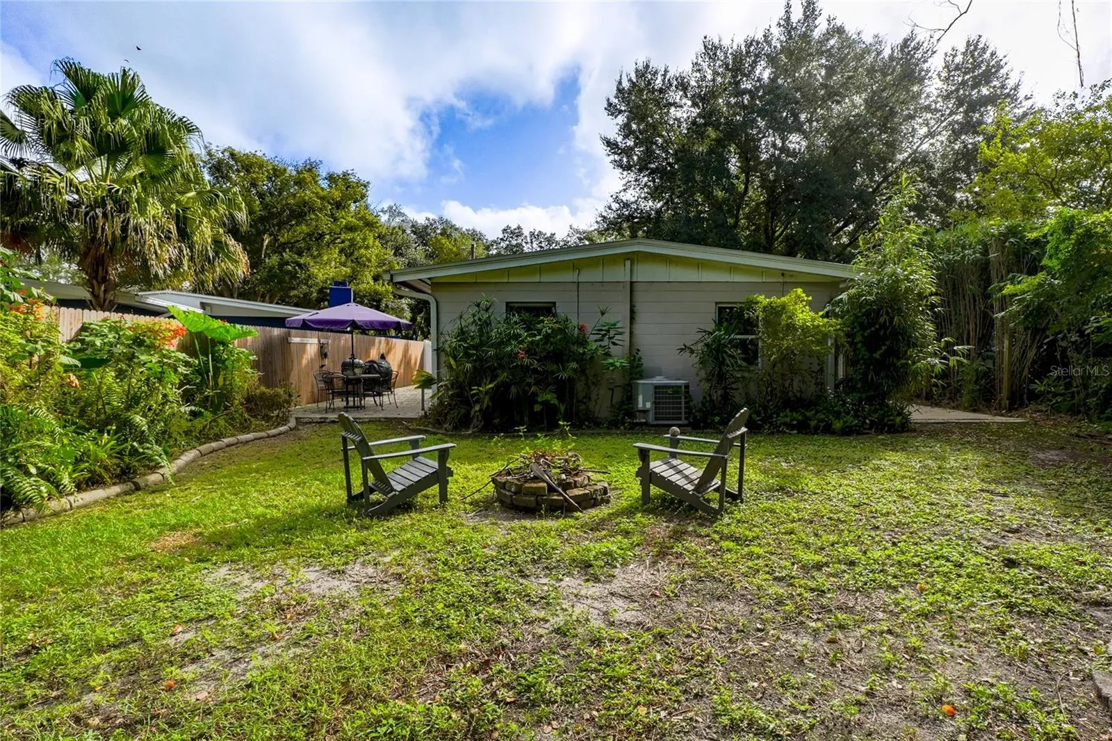 Spacious backyard for relaxing and gathering.