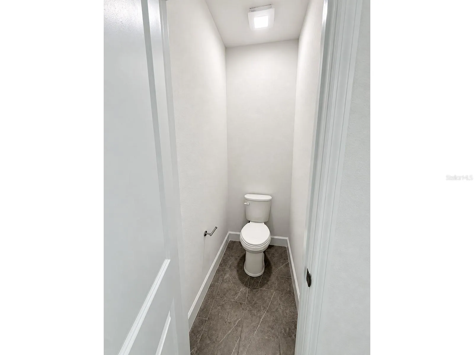 Main house: primary bathroom private toilet room