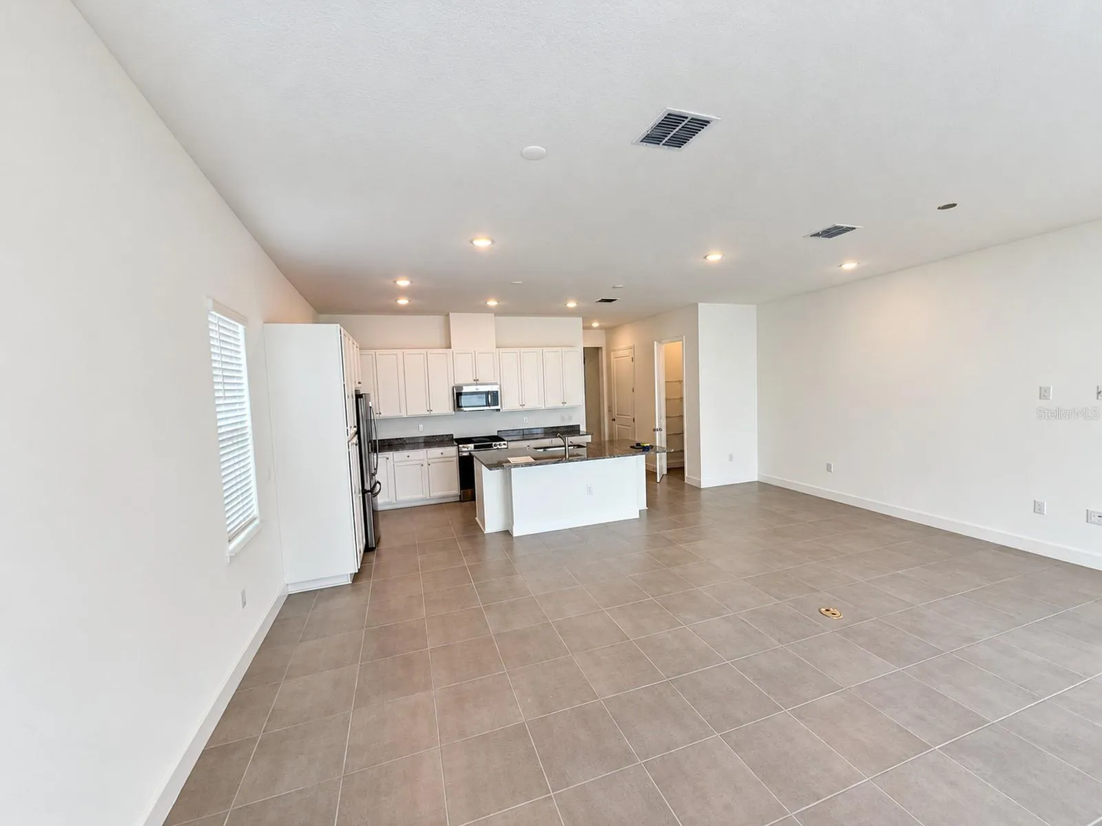Main house: open living, dining and kitchen area