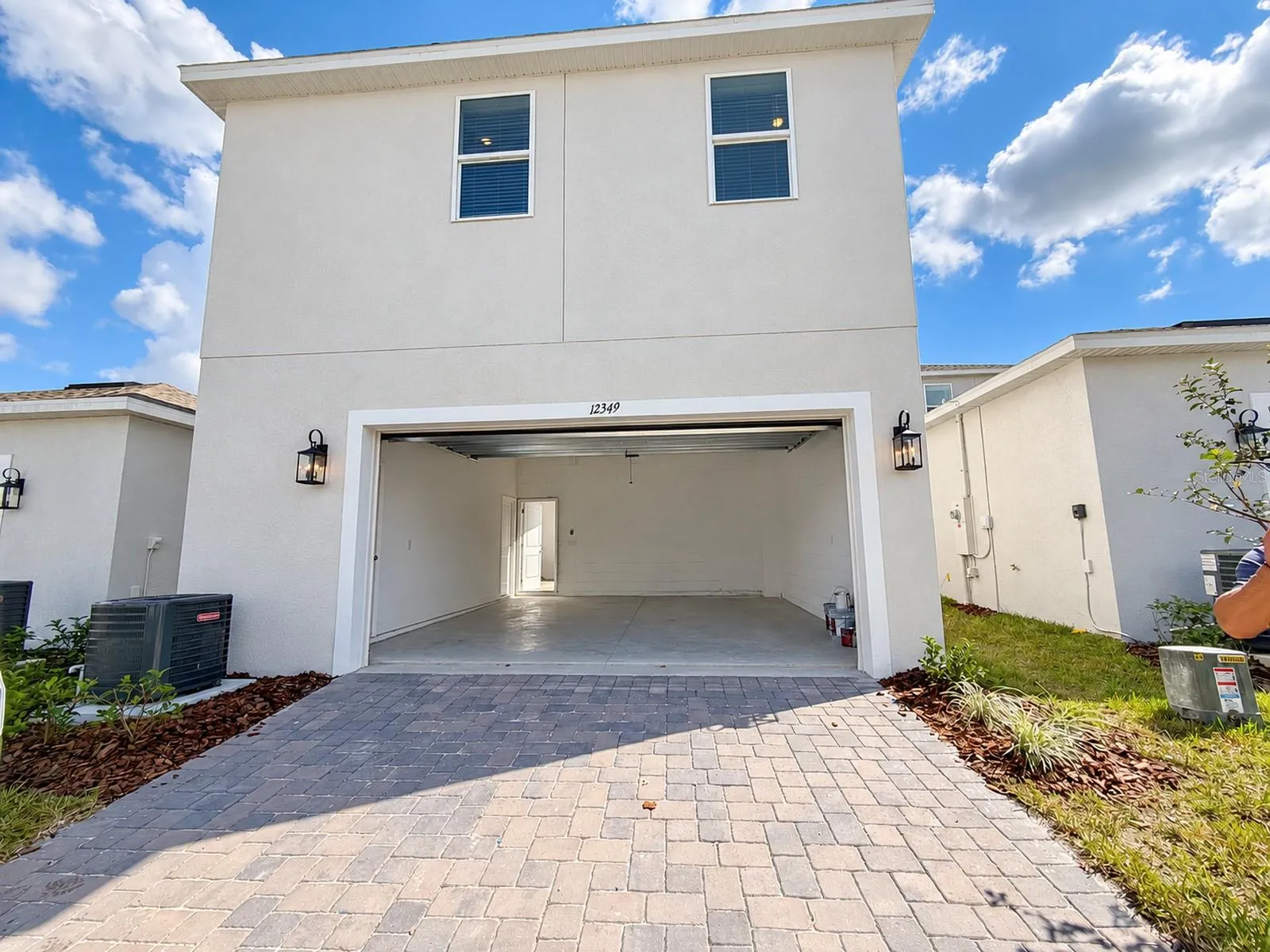 Detached 2-car garage with studio above, alley access