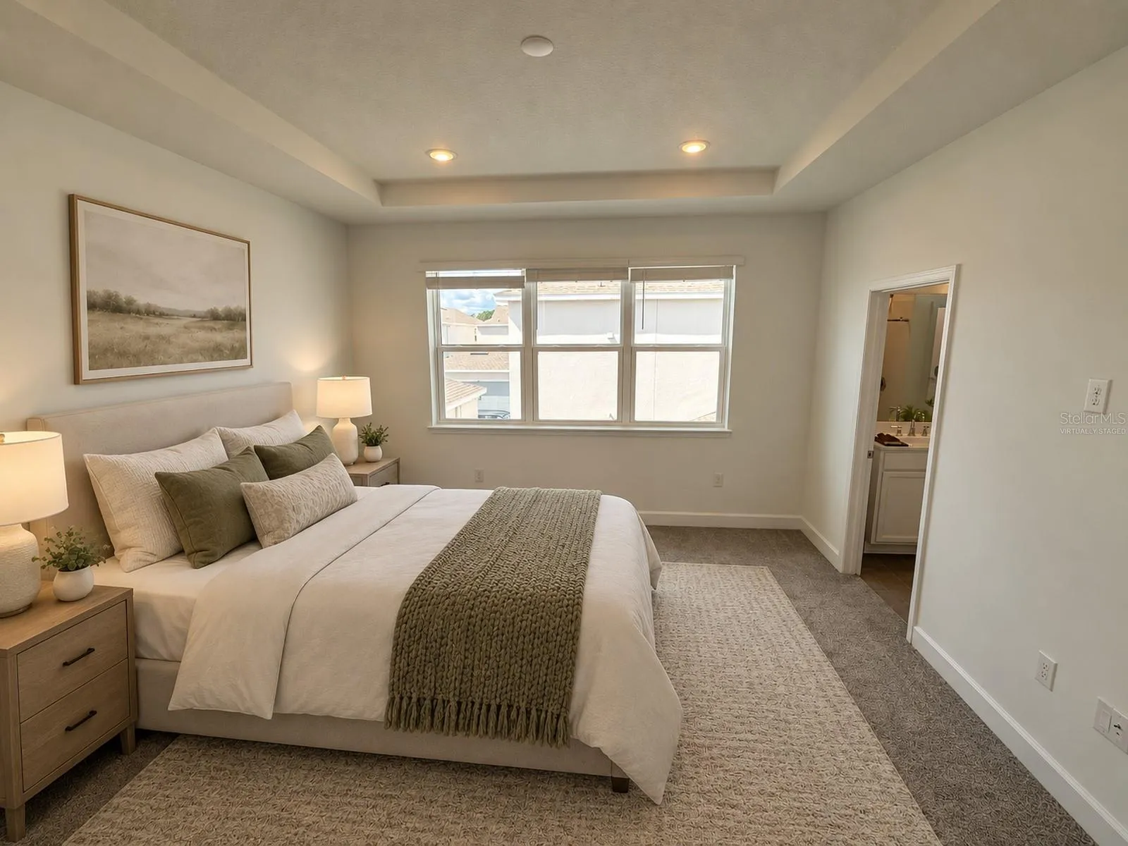 Main house: primary bedroom (virtually staged)
