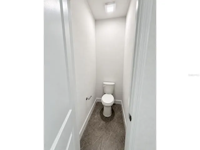 Main house: primary bathroom private toilet room