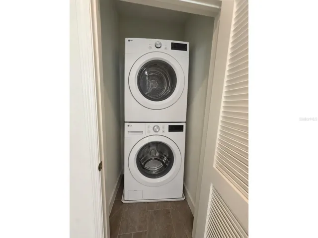 Studio: laundry room with washer and dryer