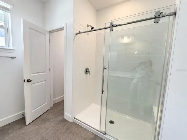 Main house: primary bathroom walk-in shower