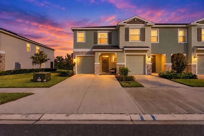 Enjoy beautiful sunsets from the front. Double driveway