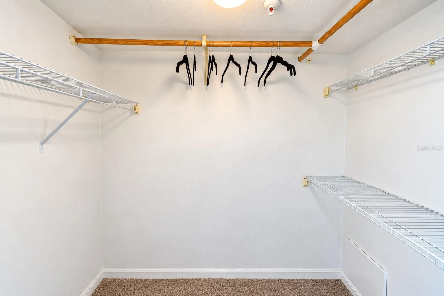 Primary Bedroom Walk-in Closet.