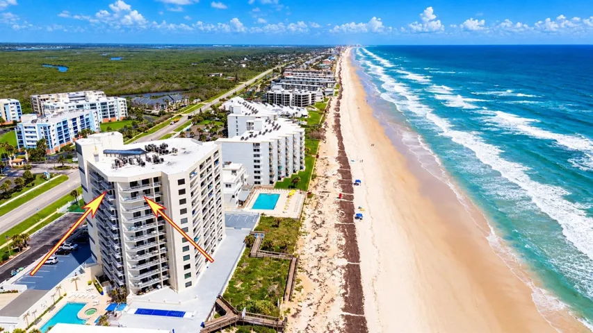 11th Floor unit with three balconies and views from the beach to the river.