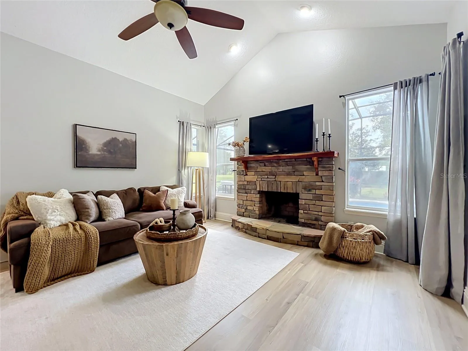 Family room with wood burning fireplace