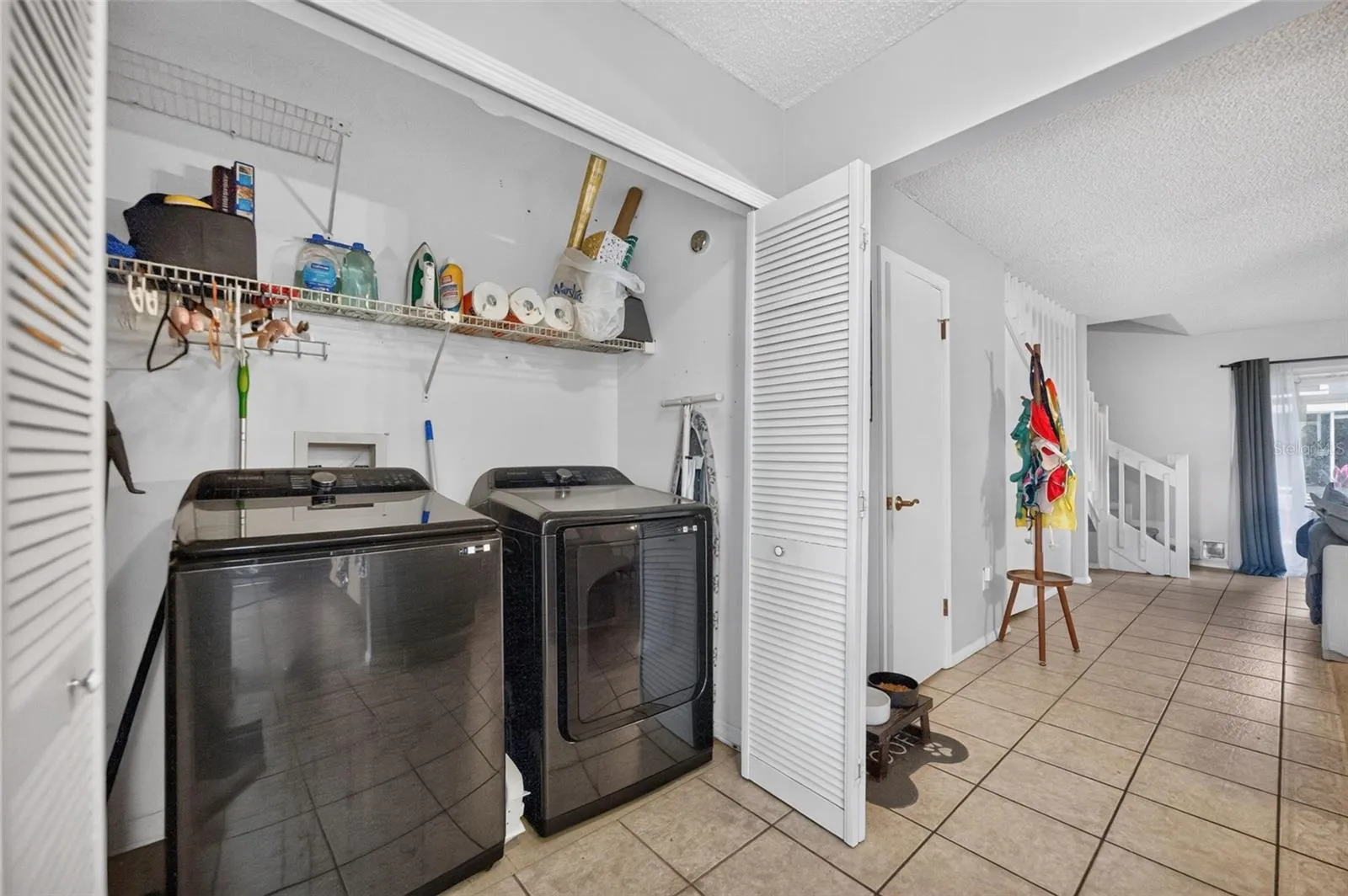 Downstairs laundry closet, so convenient!