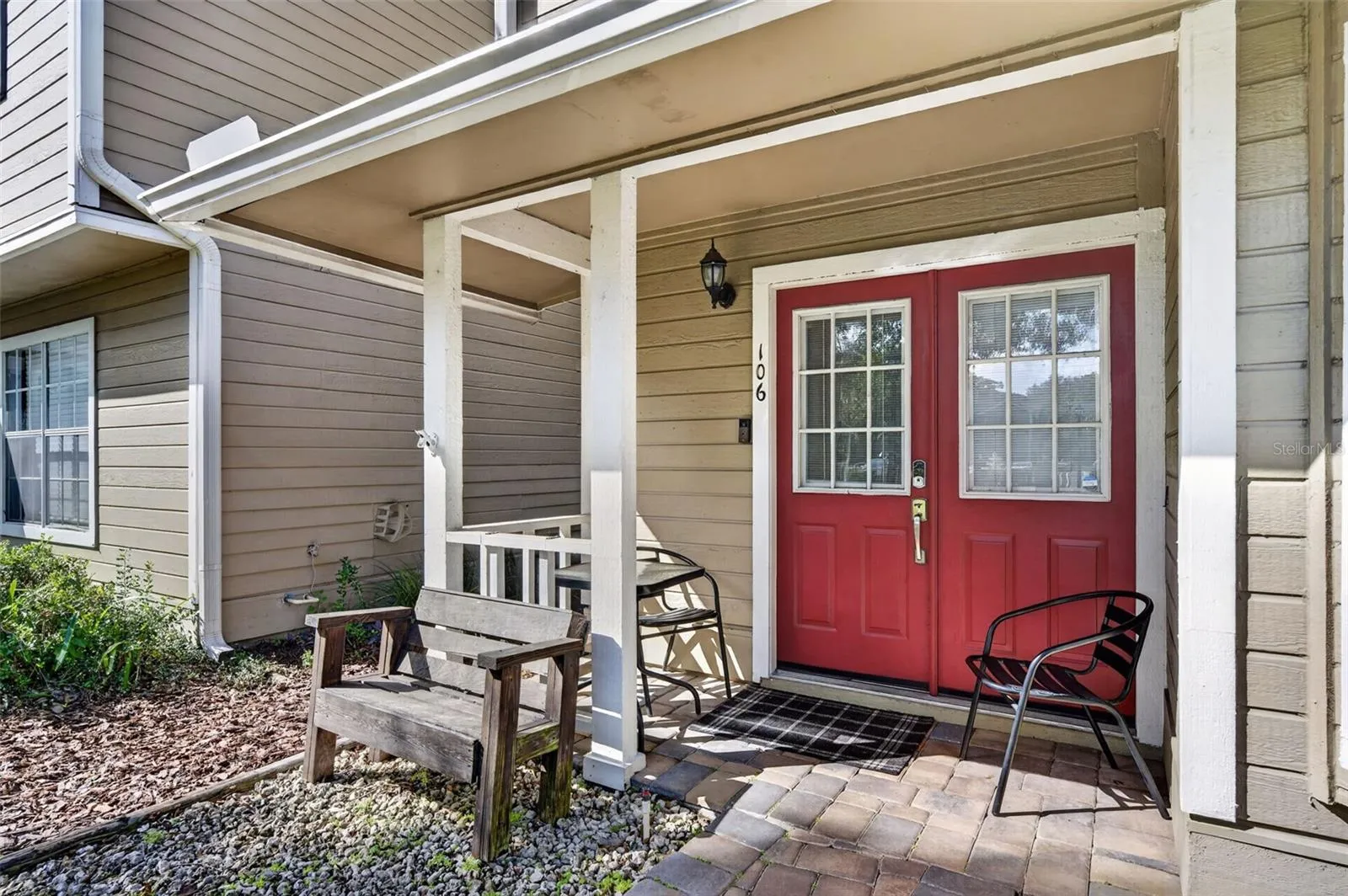 Enjoy time on your front porch looking out onto the courtyard.