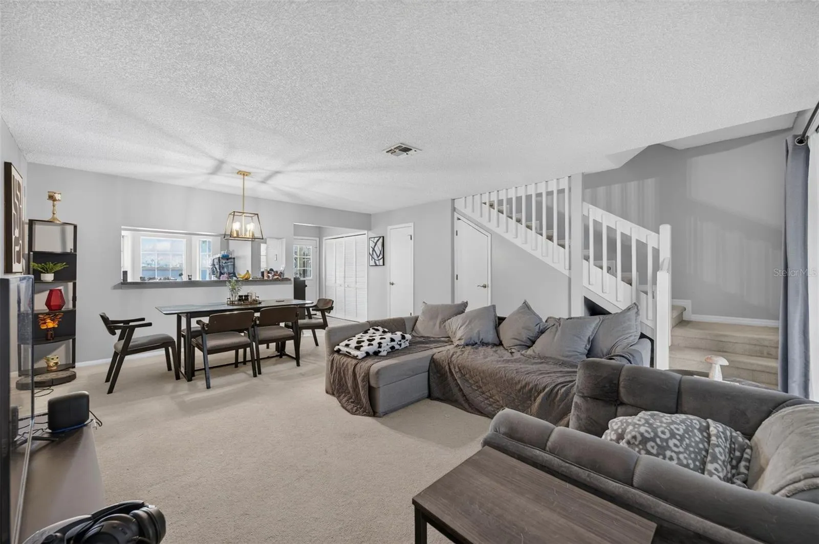 Large living space and dining make for such a comfortable place to spend time at home.