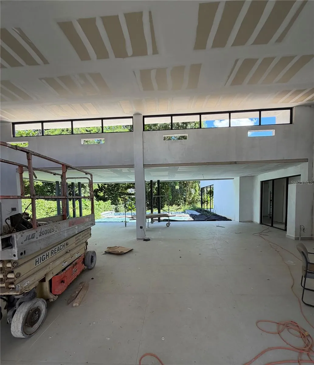 Interior layout in raw concrete state.