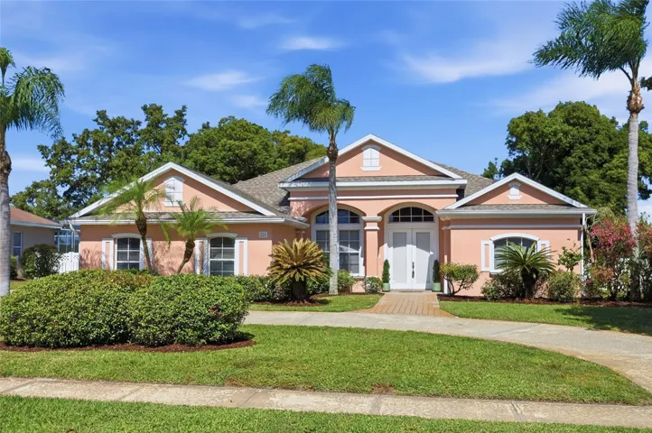 226 Alexandra Woods Drive in Glen Abbey, DeBary: a single-story, four-bedroom, three-bathpool home on nearly half an acre.