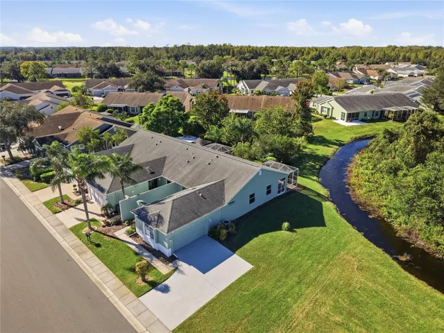 Arial view of this end unit with an amazing driveway with plenty of space for your dinner parties & guests parking