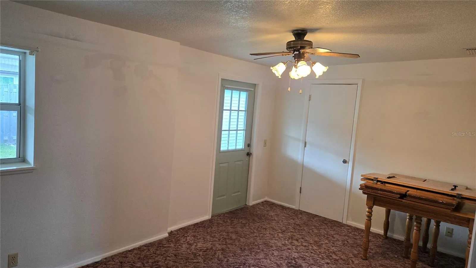 Apt 1 family room with exit to rear patio