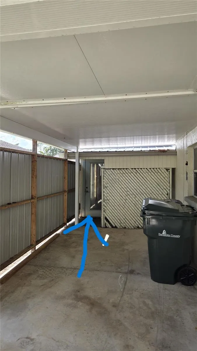 Outside entrance through carport to Apt 4