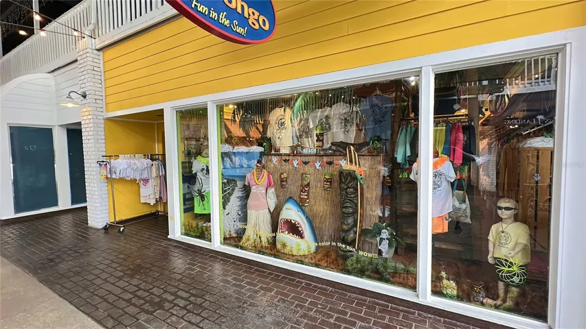 Shopping at Fisherman's Village in Punta Gorda, with boutiques and gift shops along the covered waterfront walkway.