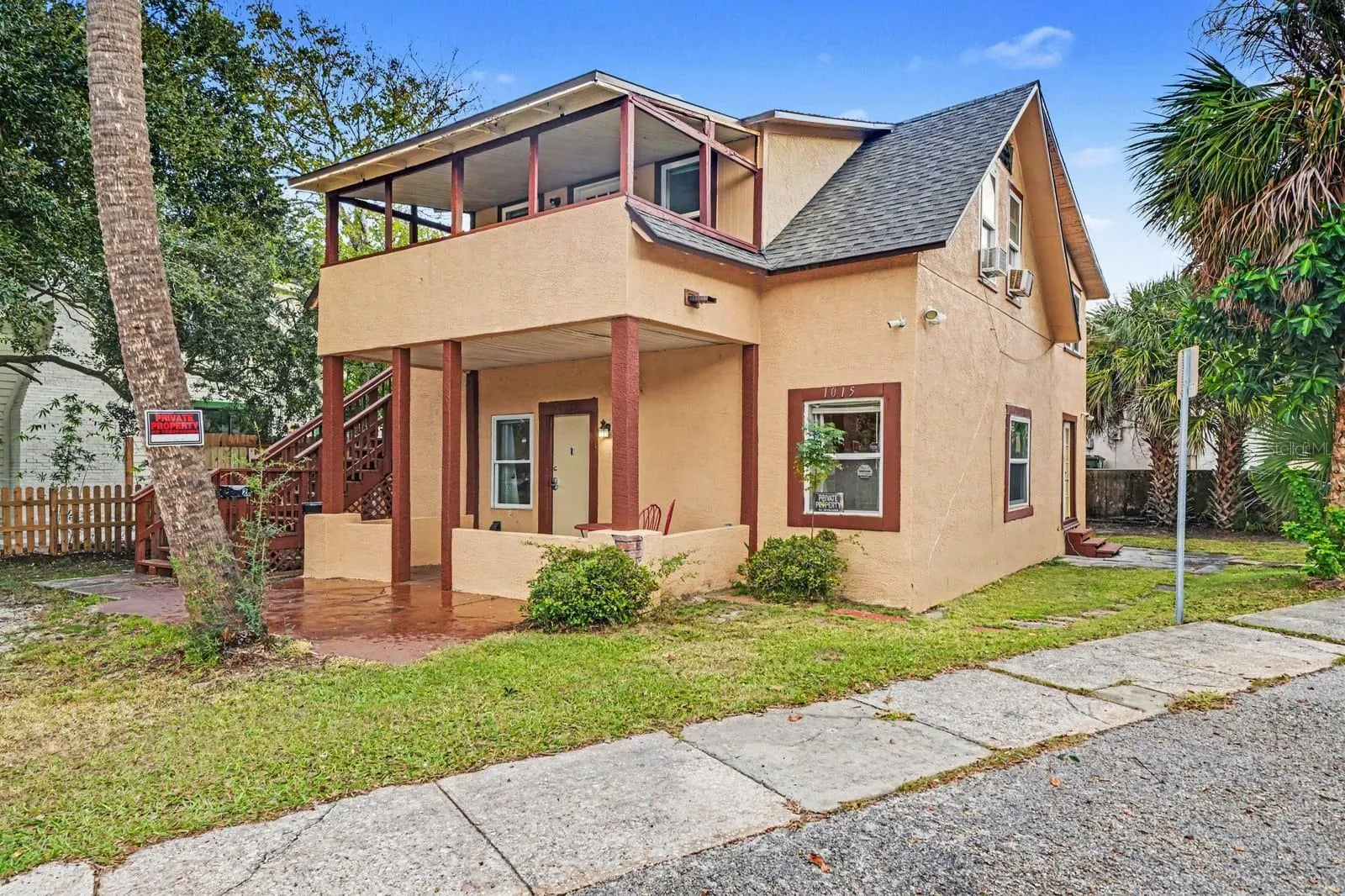 Welcoming Front Facade With Covered Entry & Upper-Level Deck
